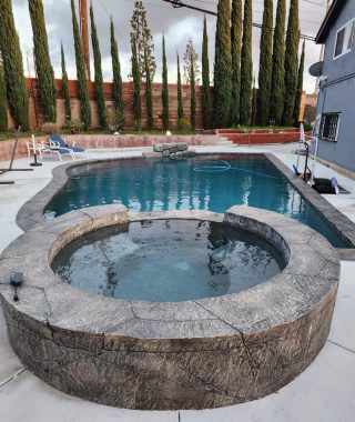 A concrete pool featuring a solid base and sturdy walls